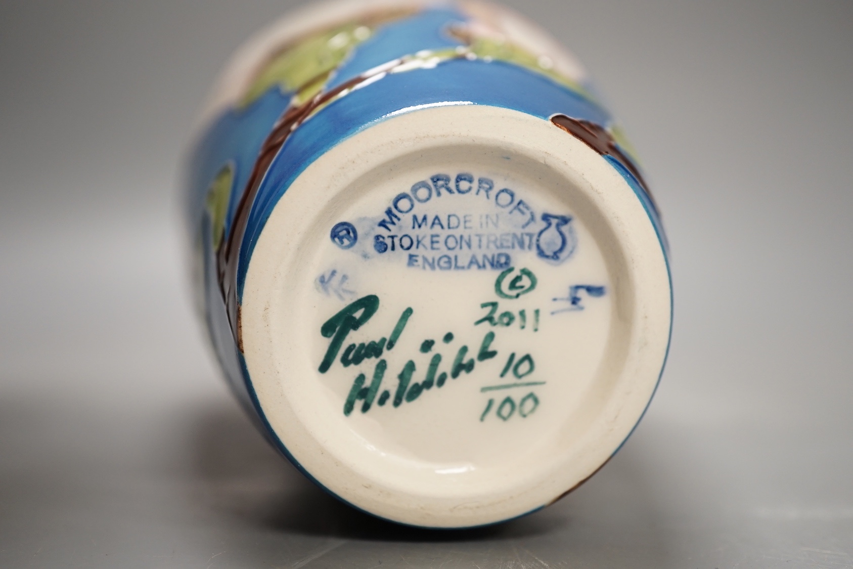 A Moorcroft 'sunshine magnolia' vase by Paul Hilditch, limited edition 10/100, 2011, boxed, 18.5 cms high.